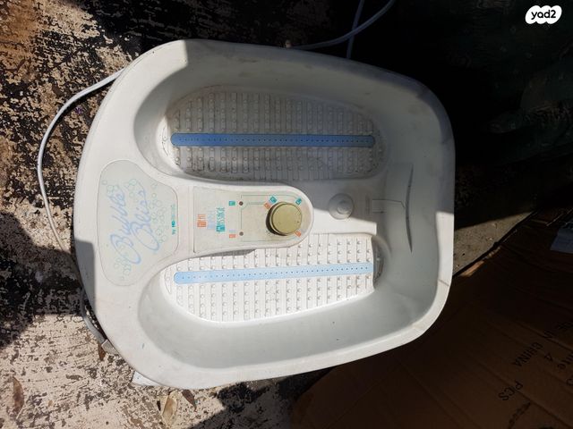 מכשיר עיסוי לרגלים