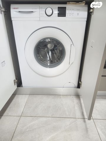 מכונת כביסה עם טיימר