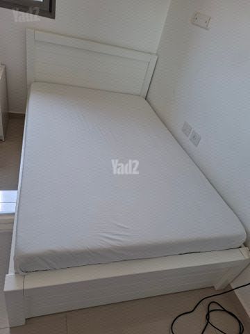 מיטה מעץ מלא