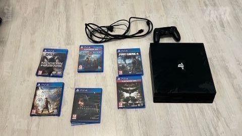 PS4 Pro 1TB + שלט ו-6 משחקים