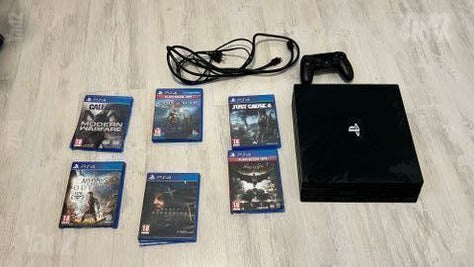 PS4 Pro 1TB + שלט ו-6 משחקים