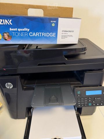 מדפסת hp m225
