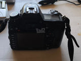 Nikon D7000 + סוללה ומטען