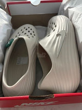Nike rejuven slides