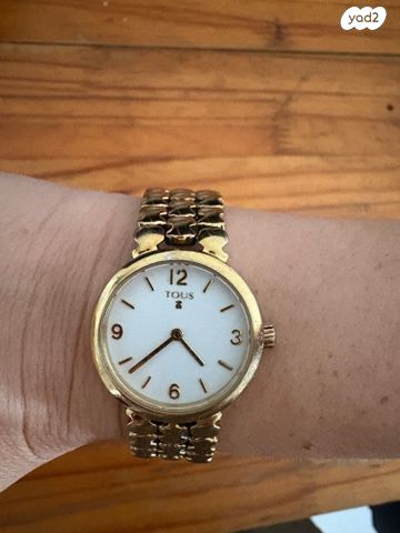 שעון מוזהב של tous