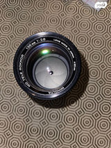עדשת זום Minolta