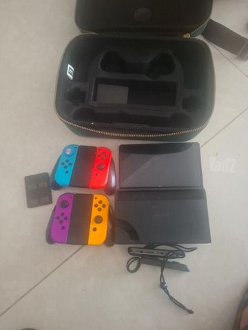 Nintendo Switch OLED + משחקים