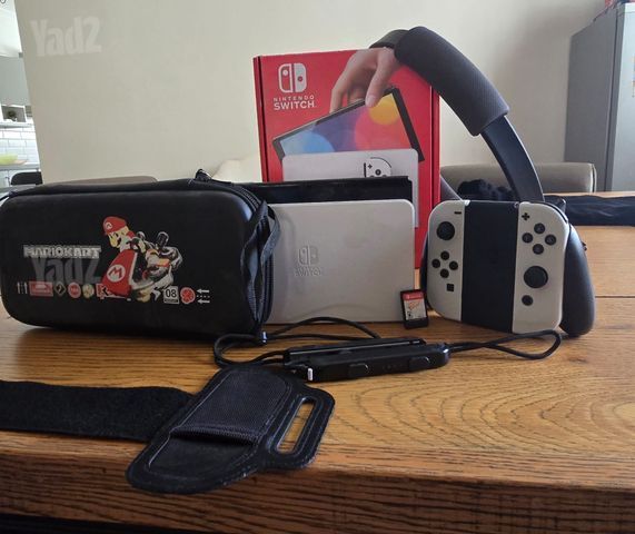 Switch Oled עם אביזרים ומשחק