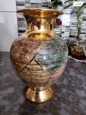 כד מעוצב מסירה גם במרכז