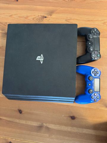 PS4 PRO 1TB + 2 DUALSHOCK פרוץ