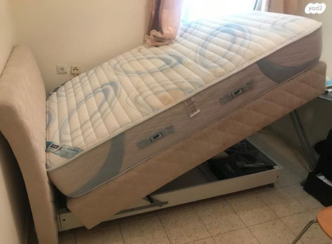 מיטה עם ארגז של עמינח