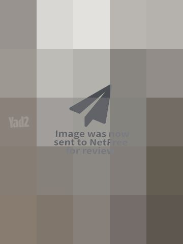 נדנדת חצר מעץ