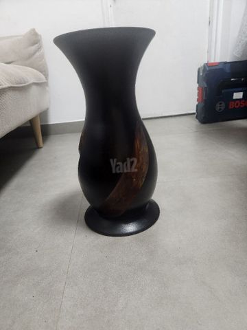 כד מעץ מגולף