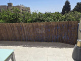 גדר עץ במבוק