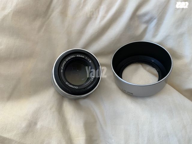 olympus עדשת