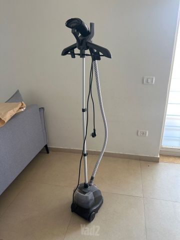 מגהץ אנכי