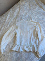 מכופתרת ZARA