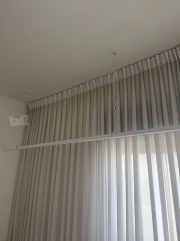 מתלה בגדים