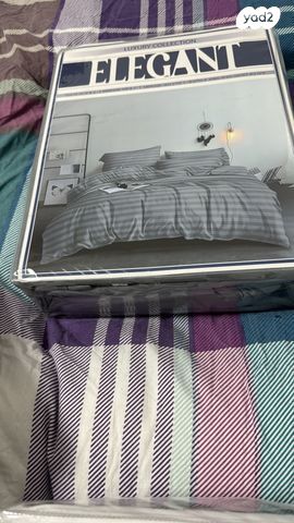 מיטה עם מזרון ושידה כחדדשה