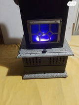 קמין עתיק על נפט. פועל.
