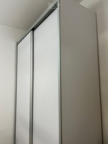 ארון הזזה לבן