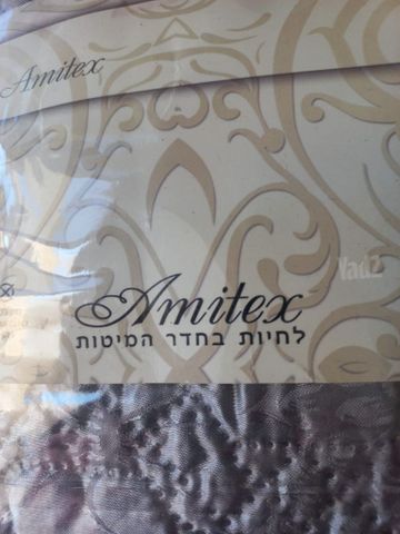 כיסוי מיטה