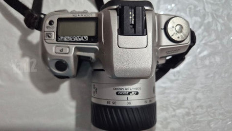 Minolta Dynax 505si + עדשה