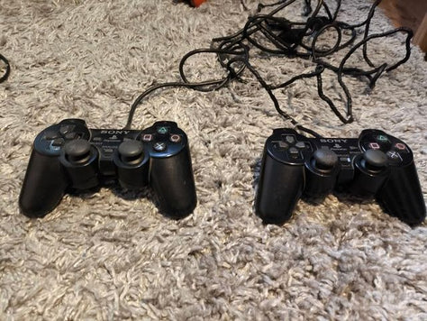 PlayStation 2 + שני משחקים