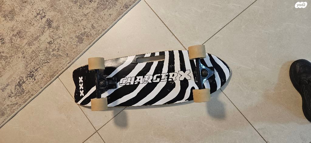 סקייטבורד x-charger