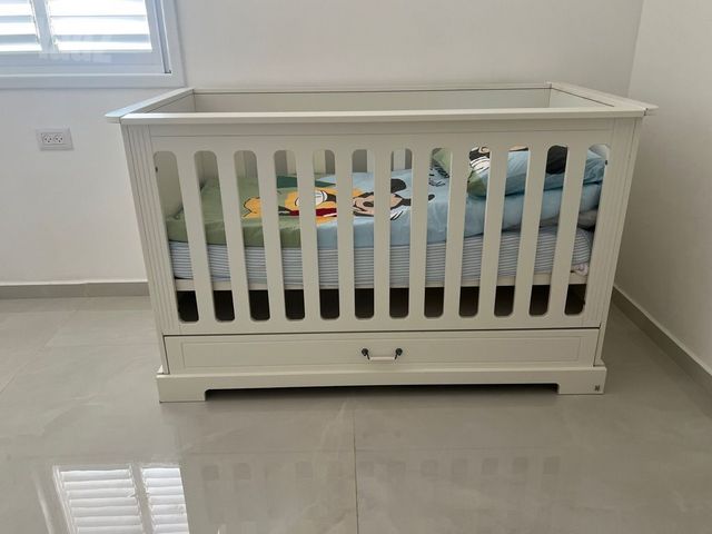 מיטת תינוק מעבר