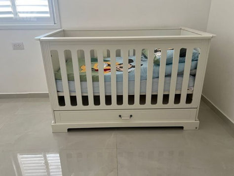 מיטת תינוק מעבר