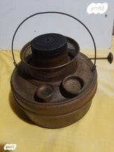 קמין עתיק על נפט. פועל.