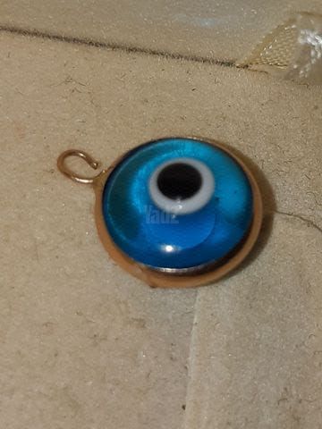 תליין זהב עם עין כחולה