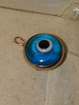 תליין זהב עם עין כחולה