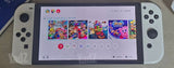 Switch Oled עם אביזרים ומשחק