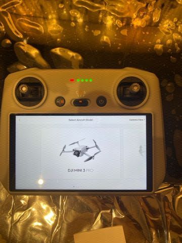 שלט רחפן DJI min 3