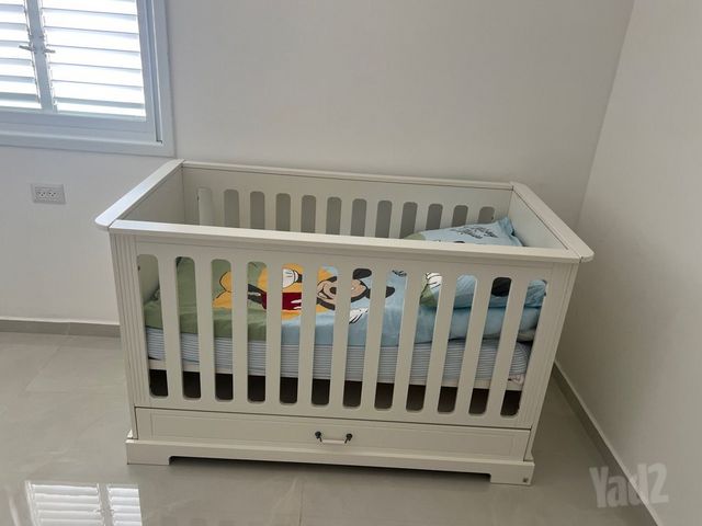 מיטת תינוק מעבר
