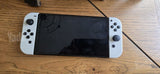 Switch Oled עם אביזרים ומשחק