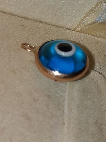 תליין זהב עם עין כחולה
